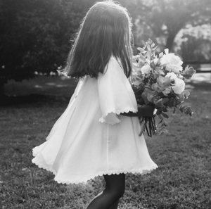 *Image above via Grace Loves Lace featuring their silk sunflower dress for little flower girls.